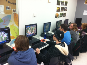 YMCA Academy students using video game during History of Civilizations class