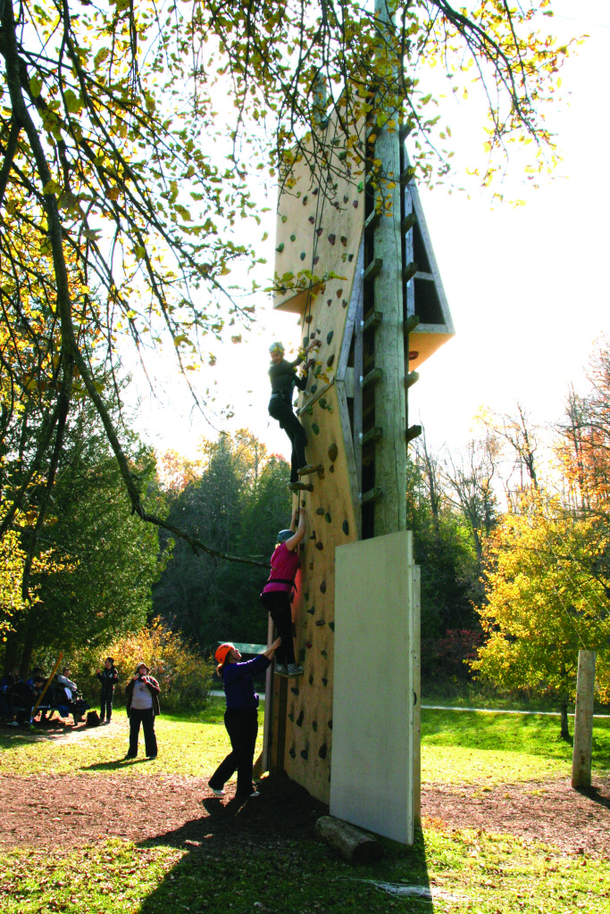 YMCA Academy students use the climbing wall at YMCA Cedar Glen Outdoor ...