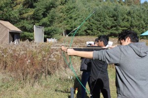 YMCA Academy students practicing archery at YMCA Cedar Glen Outdoor Centre