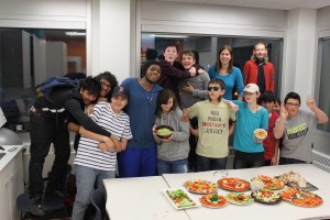 YMCA Academy students posing for a group photo during cooking club.