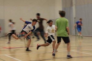 YMCA Academy students participating in physical education class at Toronto Central Grosvenor Street YMCA Centre