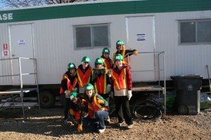 YMCA Academy students volunteering at a build site for Habitat for Humanity Holiday Campaign.