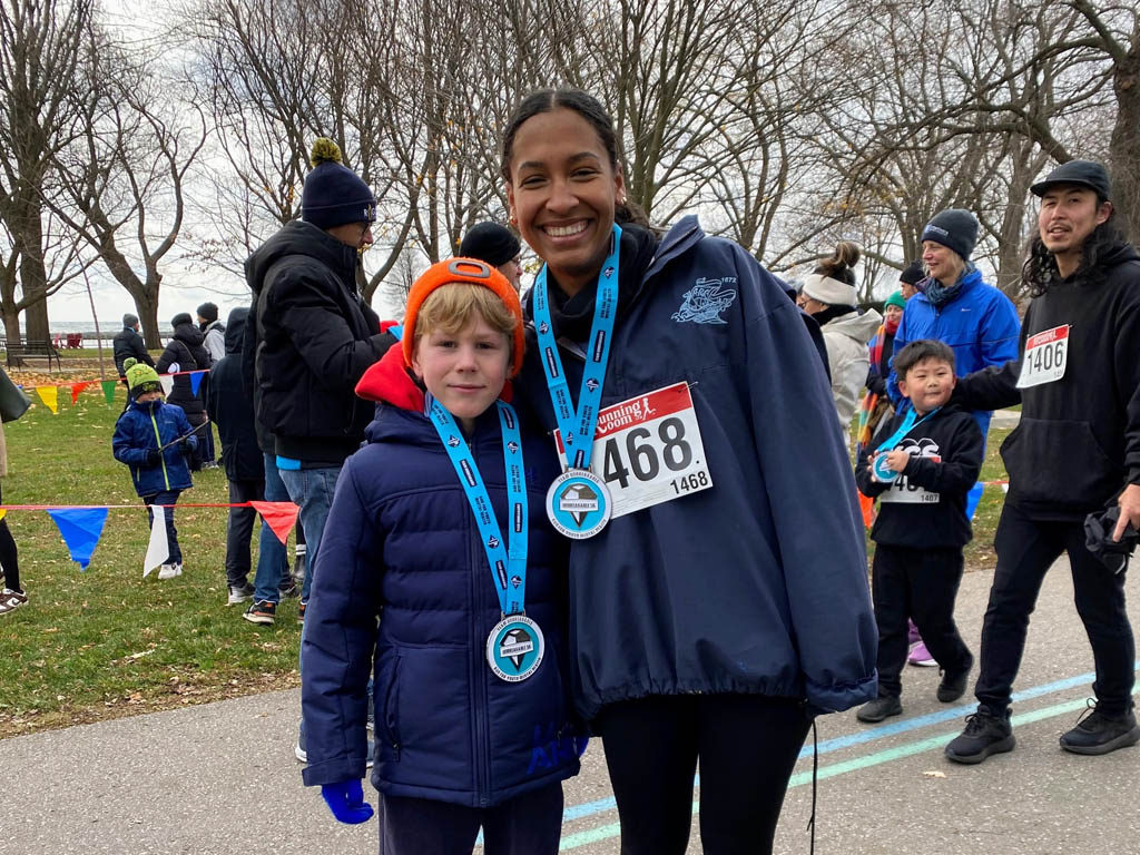 n November 30, the YMCA Academy Run Club, joined by friends and family (and even Tim!), participated in the Team Unbreakable Bold and Cold 5K.